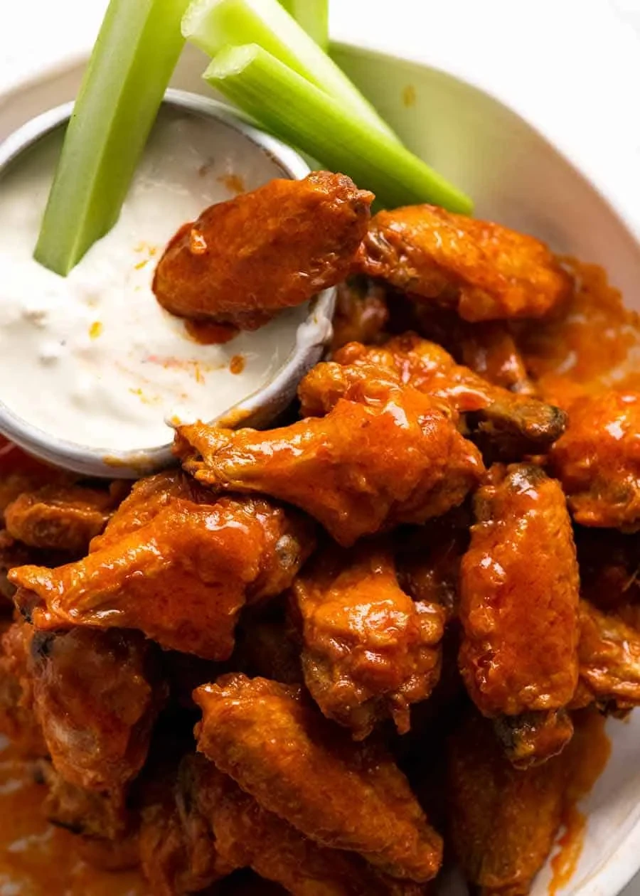 Buffalo chicken wings with celery and blue cheese dressing