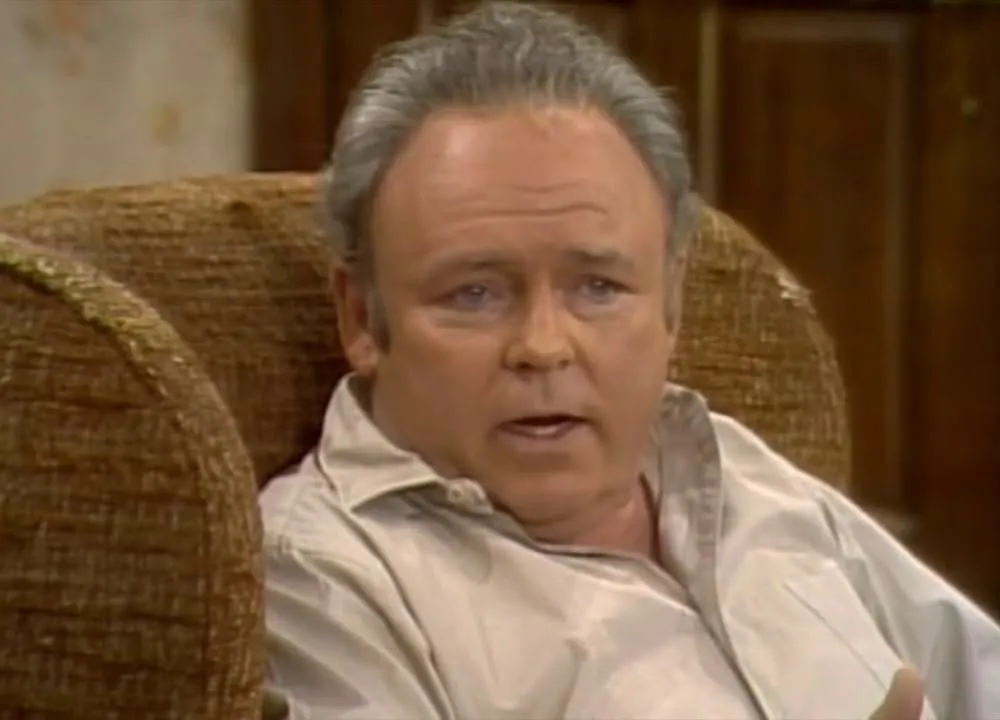 Archie Bunker sitting in his chair