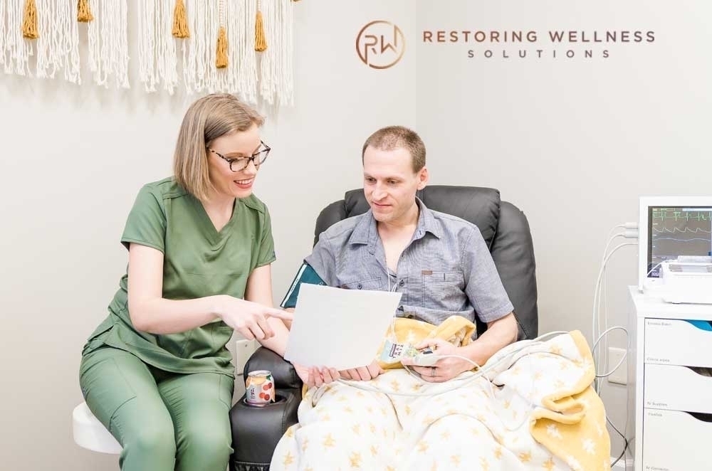 Nurse talking to patient 